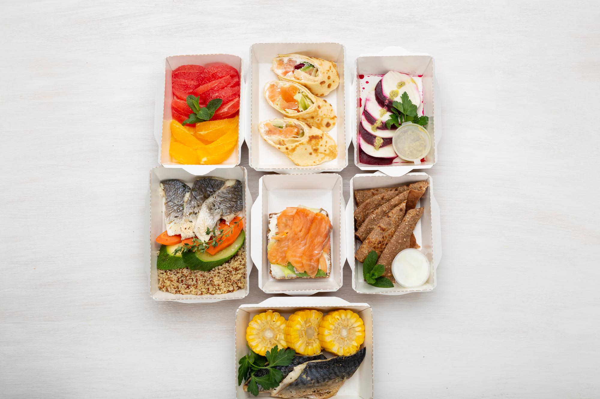 Assortment of packaged meal kits on counter